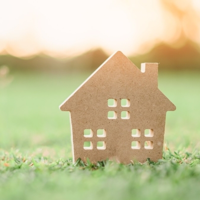cutout of house in grass