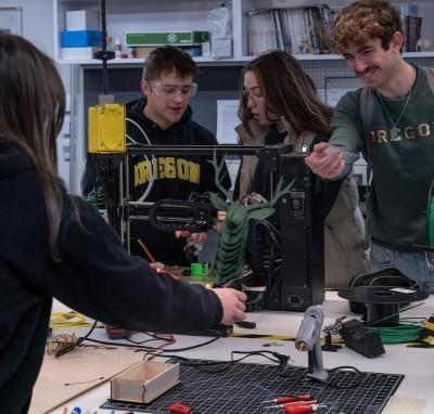 students working with equipment in a lab